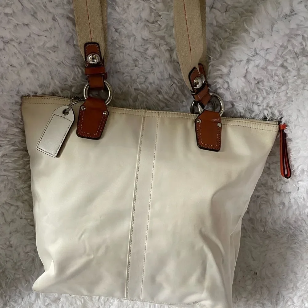 Coach Hampton Beige satin and orange accents satchel with silver tone hardwares